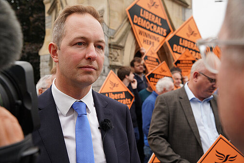 Foord activists interview Richard Foord being interviewed in front of activists and signs reading "Liberal Democrats Winning here"
