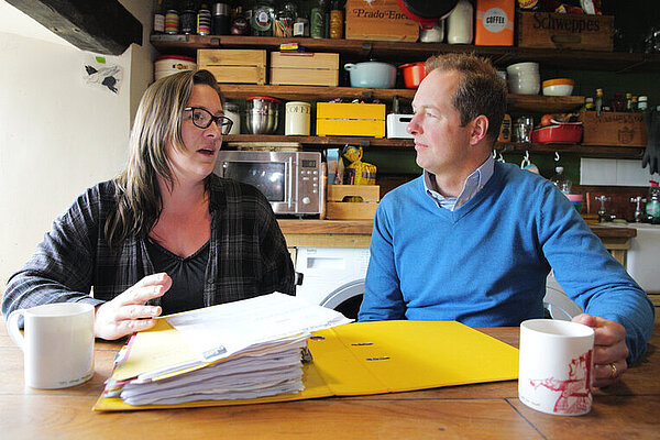Richard Foord document file Richard Foord sat at a table talking to a woman